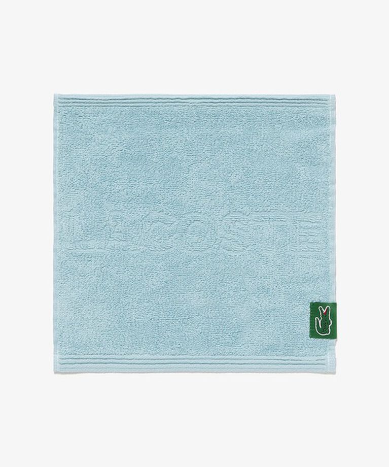 LACOSTE「ワントーンブランディングタオルハンカチ」|タオル|ライトブルー